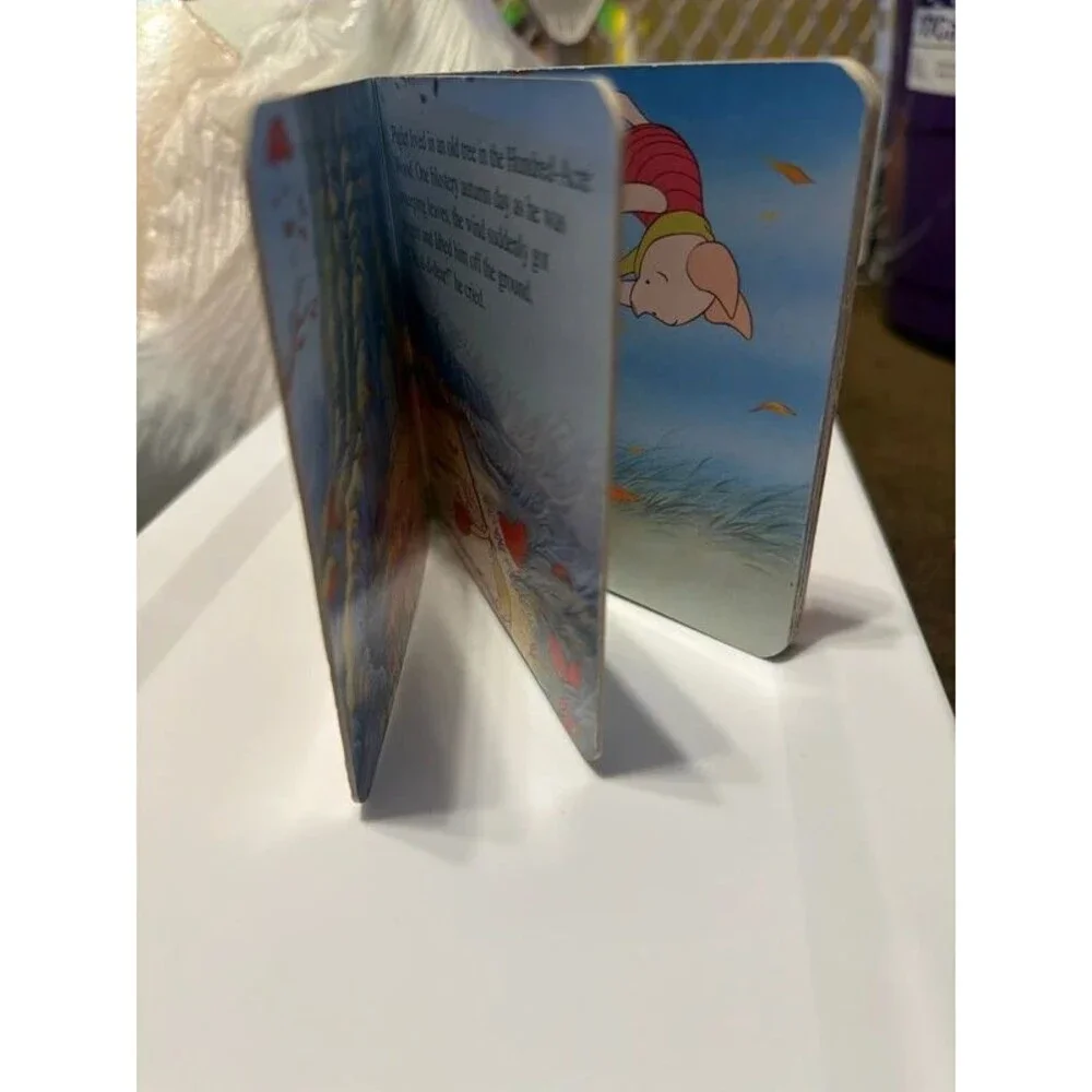 Piglet flies high board book